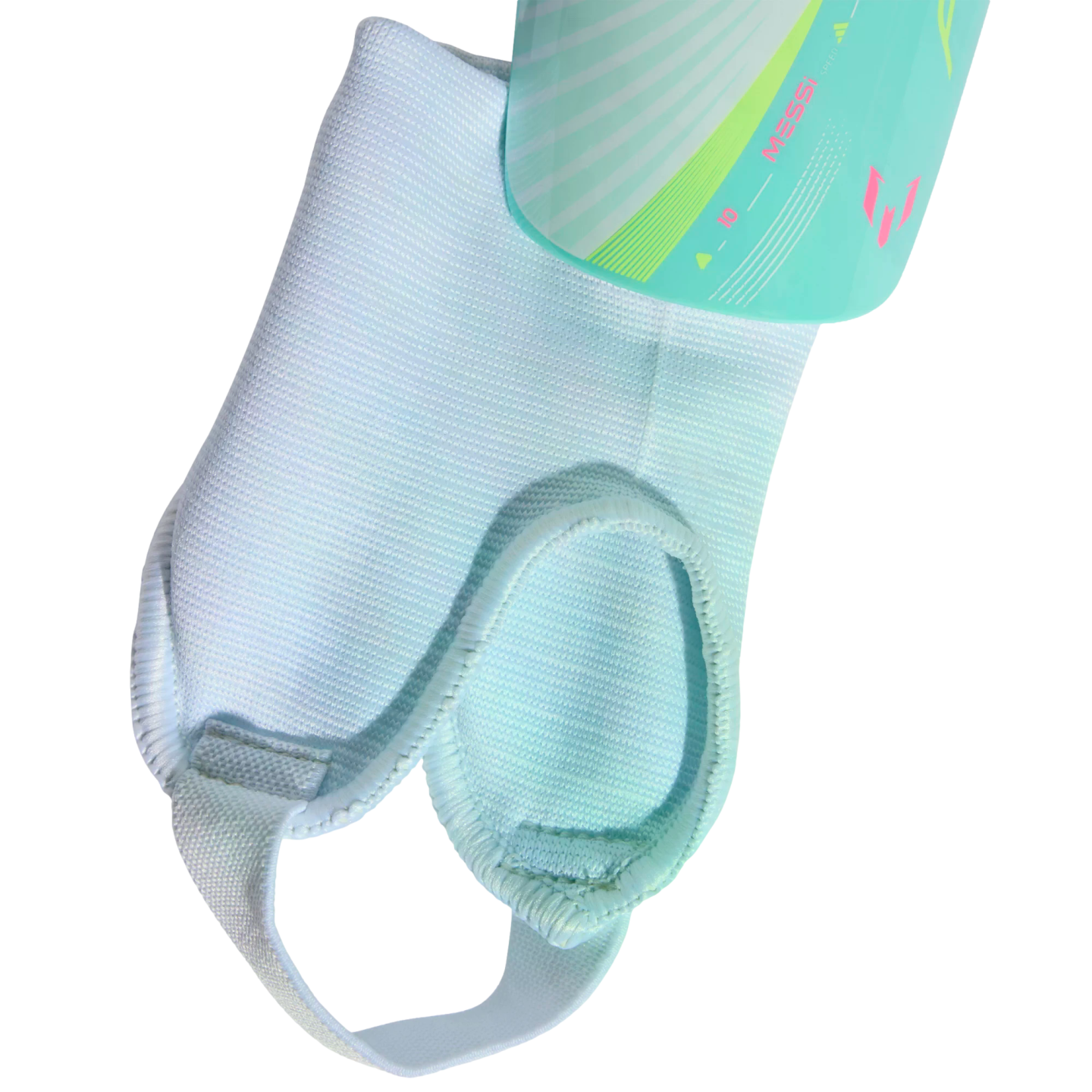 Light blue shin guard sleeve with ankle padding and a foot strap. A teal Messi-branded shin guard is partially visible at the top against a black background.