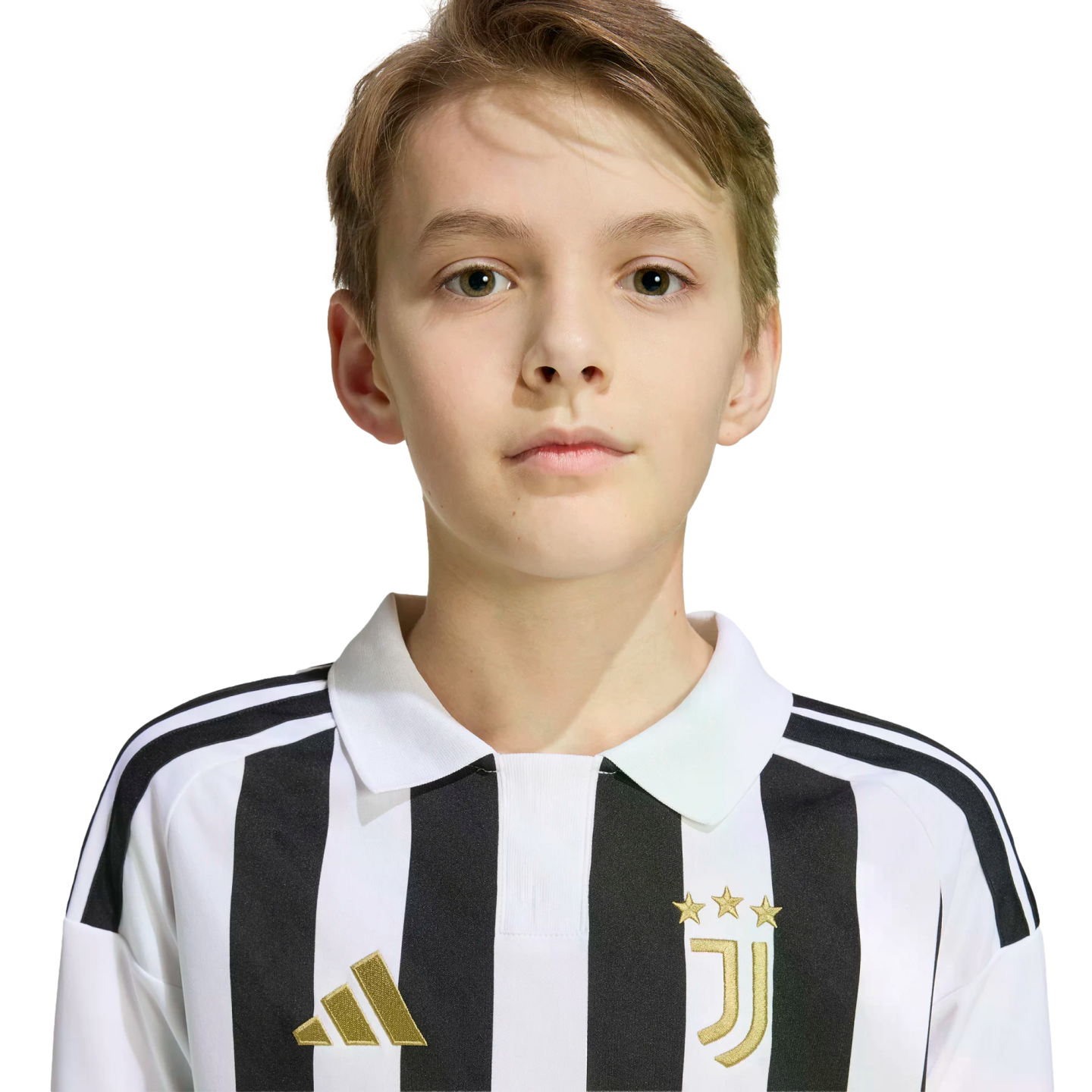 Portrait of a young boy with light brown hair wearing a black and white striped Juventus jersey against a white background.