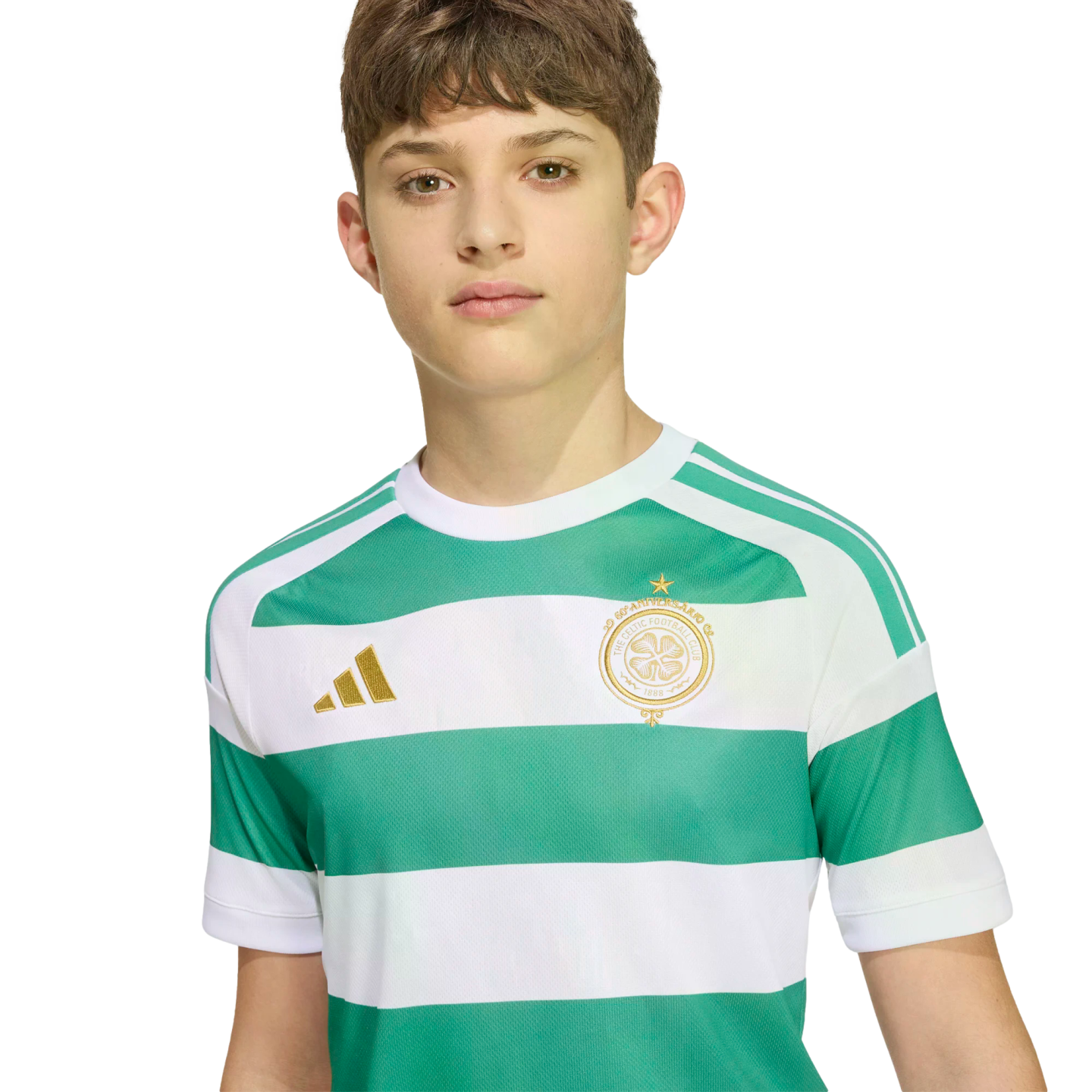 A young boy wearing a green and white striped Celtic FC soccer jersey with gold logos, set against a plain white background.
