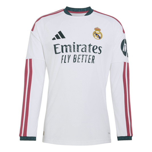 Long-sleeved white Real Madrid home jersey featuring dark red shoulder stripes, dark green collar and cuffs, and the Emirates sponsor logo across the chest.