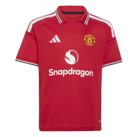 Red Manchester United home jersey with the white Adidas logo, club crest, and Snapdragon sponsor. It features white shoulder stripes and black-and-white trim on the collar and sleeve cuffs.