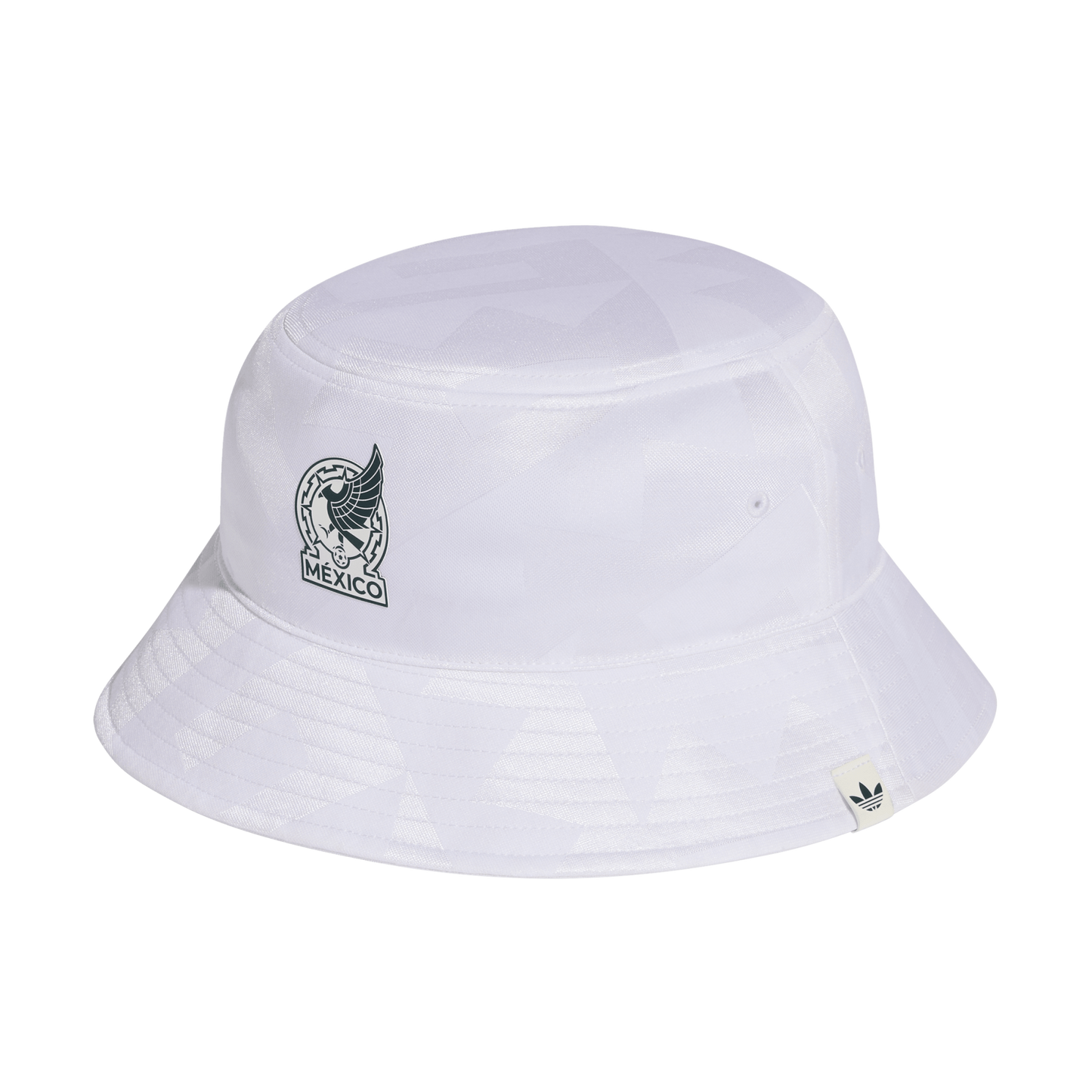 White bucket hat with a subtle tonal pattern, featuring the Mexico national football team logo and a small Adidas tag on the brim. Black background.