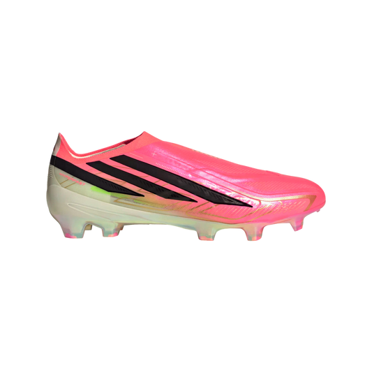 Side view of a vibrant pink laceless Adidas soccer cleat with black stripes and an iridescent soleplate, isolated on a white background.