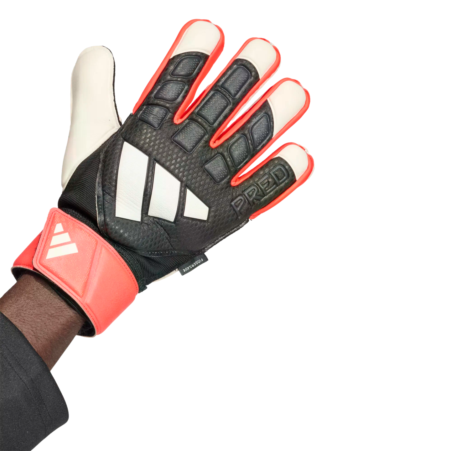 An Adidas Predator goalkeeper glove in black, coral, and white, featuring the brand's logo and "PRED" text. The glove is worn on a hand against a plain white background.