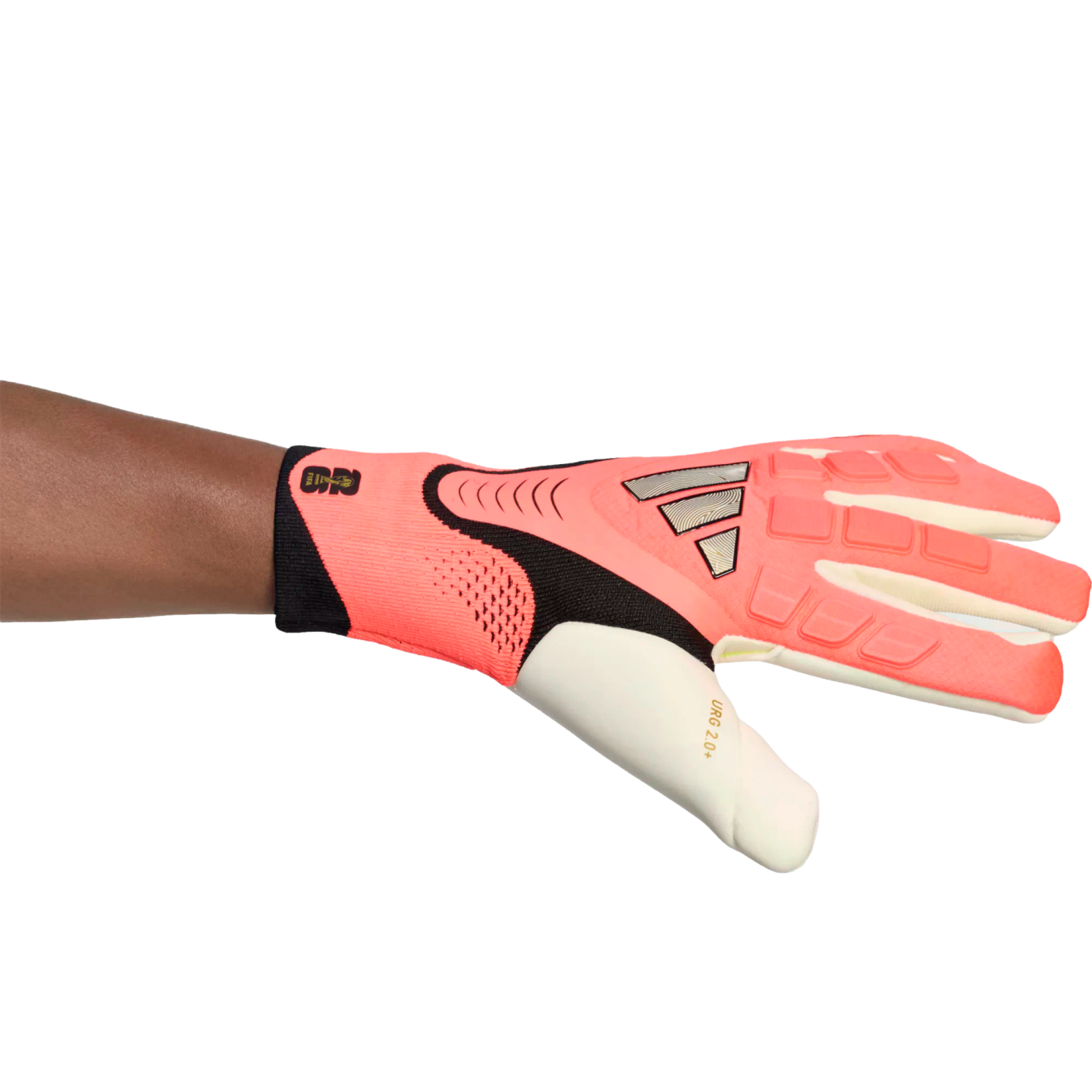 A pink and black Adidas goalkeeper glove with "URG 2.0+" branding, worn on a left arm and shown horizontally against a white background.