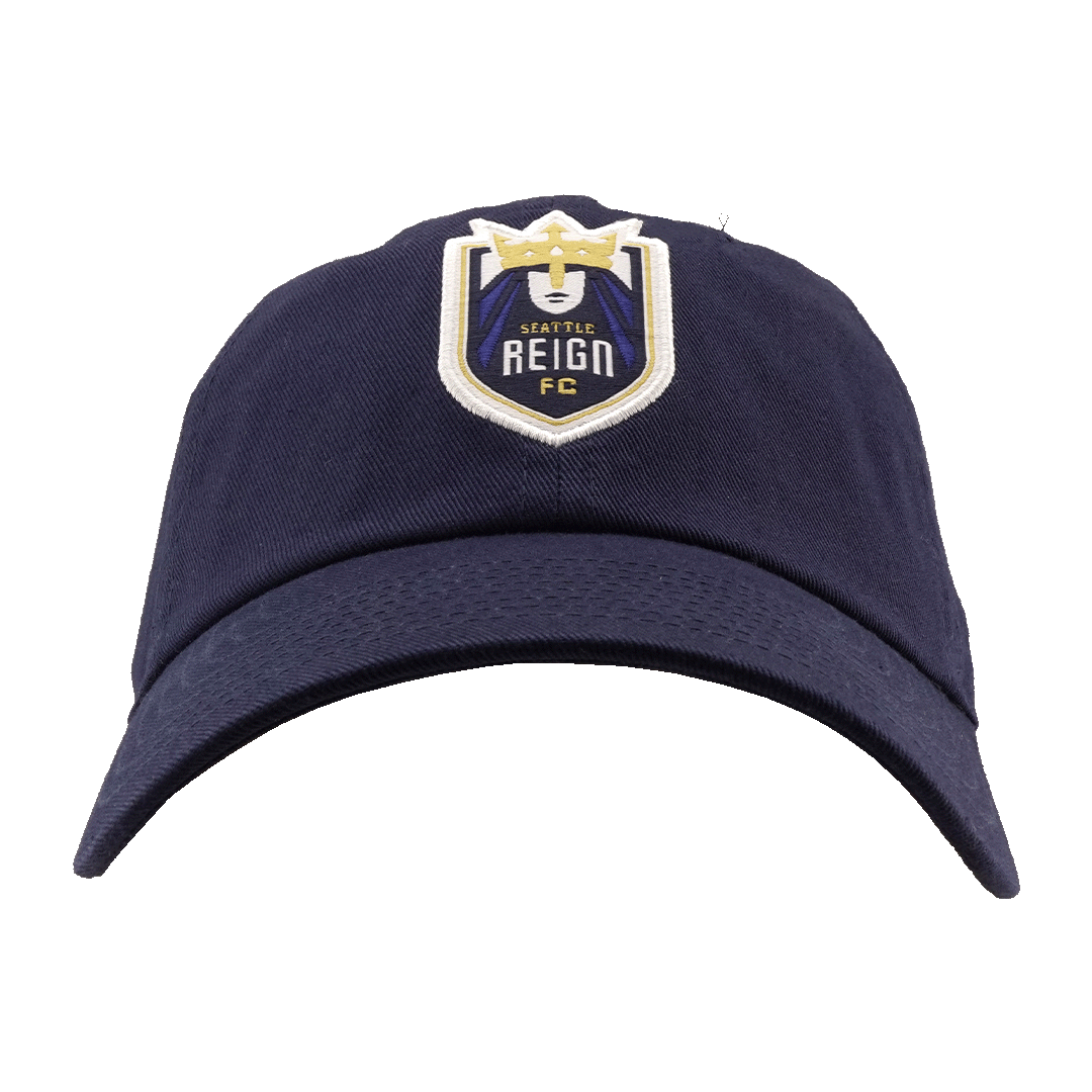 Navy blue baseball cap featuring the Seattle Reign FC crest on the front, set against a solid green background.