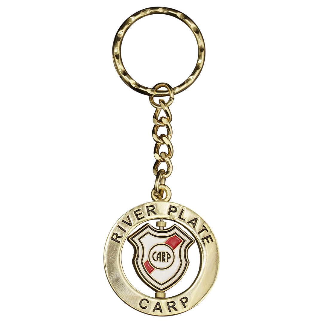 Gold-tone keychain for Argentine sports club River Plate. It features a circular fob with "RIVER PLATE" and "CARP" text surrounding a spinning shield-shaped crest.