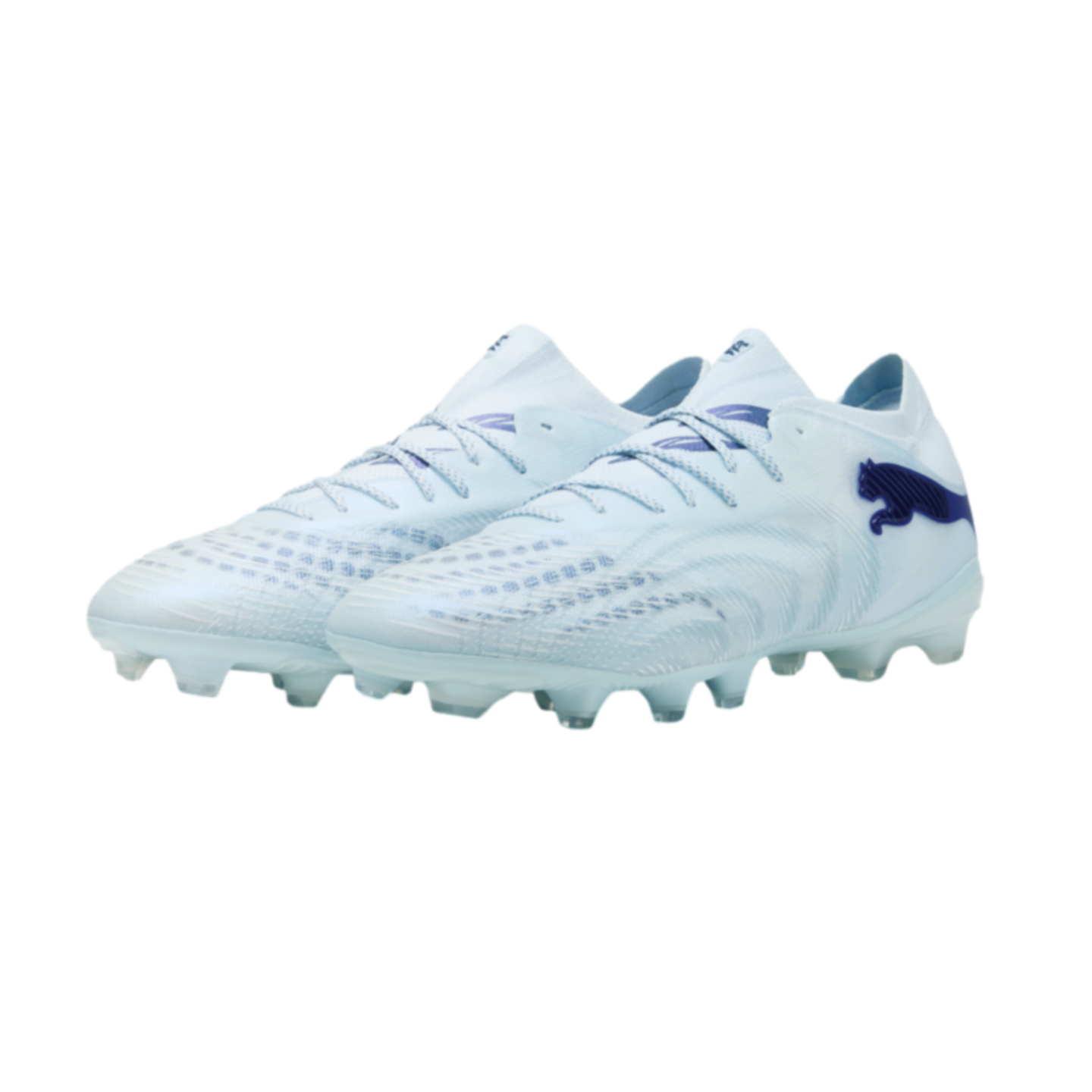 A pair of light blue Puma soccer cleats with dark blue accents and logo, shown against a solid black background.
