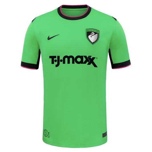 Lime green soccer jersey with black and pink trim. Features a Nike swoosh, a Boston swan crest, and a large black TJ Maxx sponsor logo on the front.
