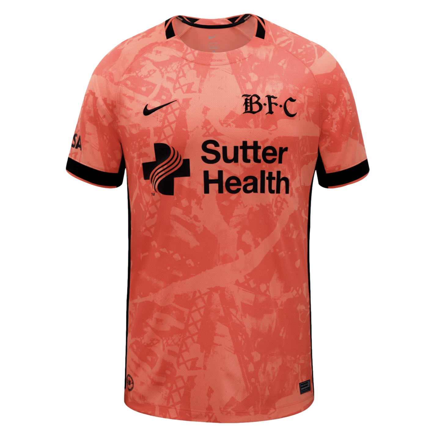 Peach soccer jersey with an abstract pattern and black Nike, 'B.F.C' gothic, and Sutter Health logos. Black trim on collar and sleeves.