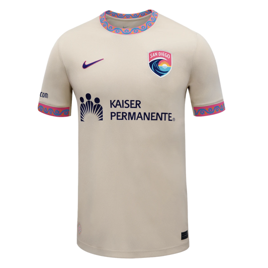 San Diego Wave FC off-white soccer jersey with a colorful patterned collar, team crest, and Kaiser Permanente sponsor logo.