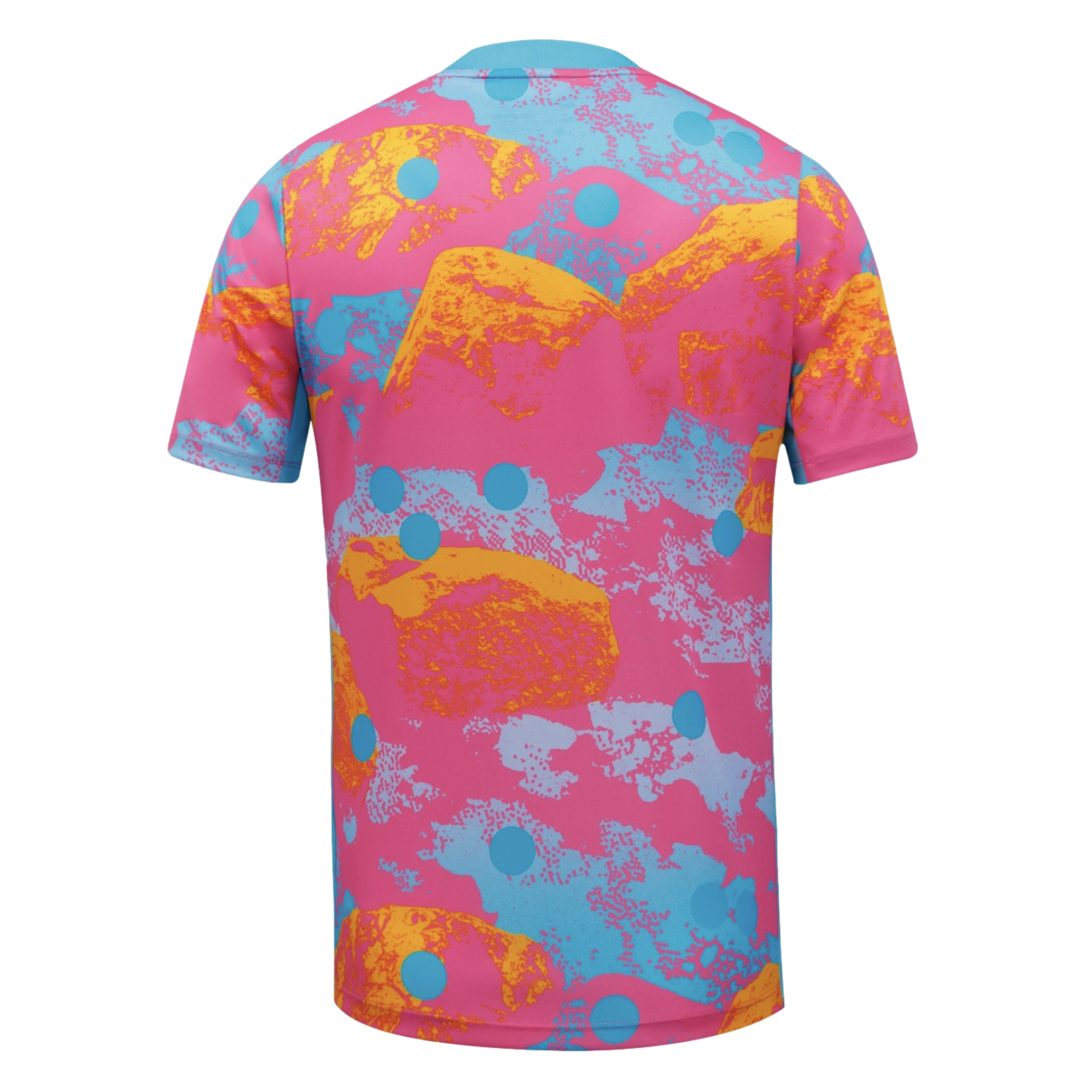 Back view of a vibrant short-sleeved T-shirt with an abstract pattern of pink, blue, orange, and yellow shapes, accented with light blue polka dots.