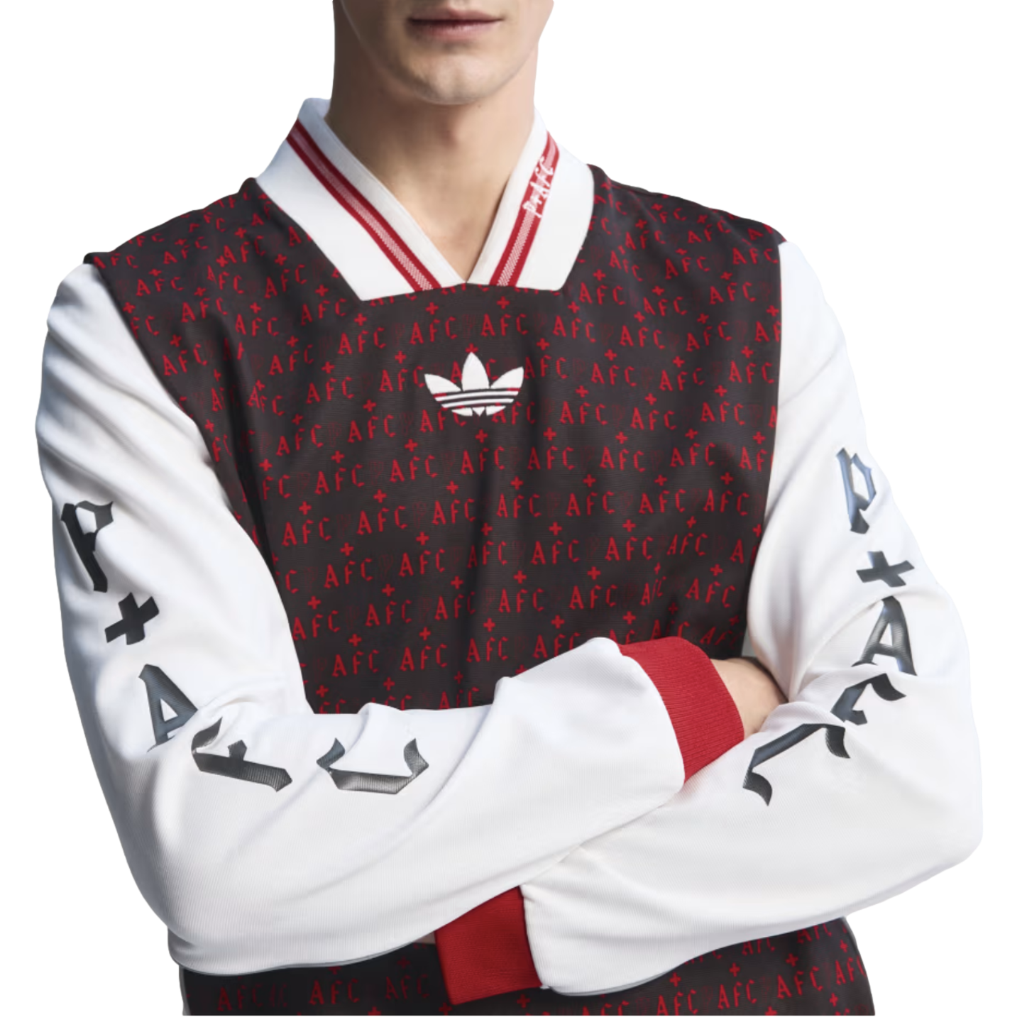 Man wearing an Adidas long-sleeve jersey with a dark, patterned 'AFC' torso, white sleeves featuring gothic 'P+AFC' text, red cuffs, and a striped V-neck collar.
