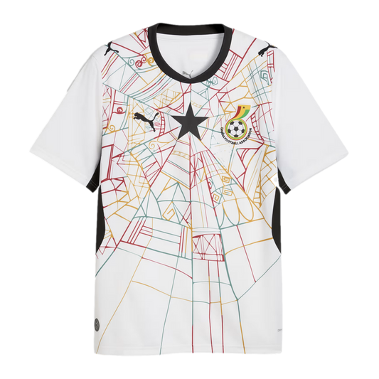 A white Ghana national football team jersey with a black round collar and black side panels. The front features an intricate, colorful geometric pattern resembling a spiderweb in red, yellow, and green. A large black five-pointed star is centered on the c