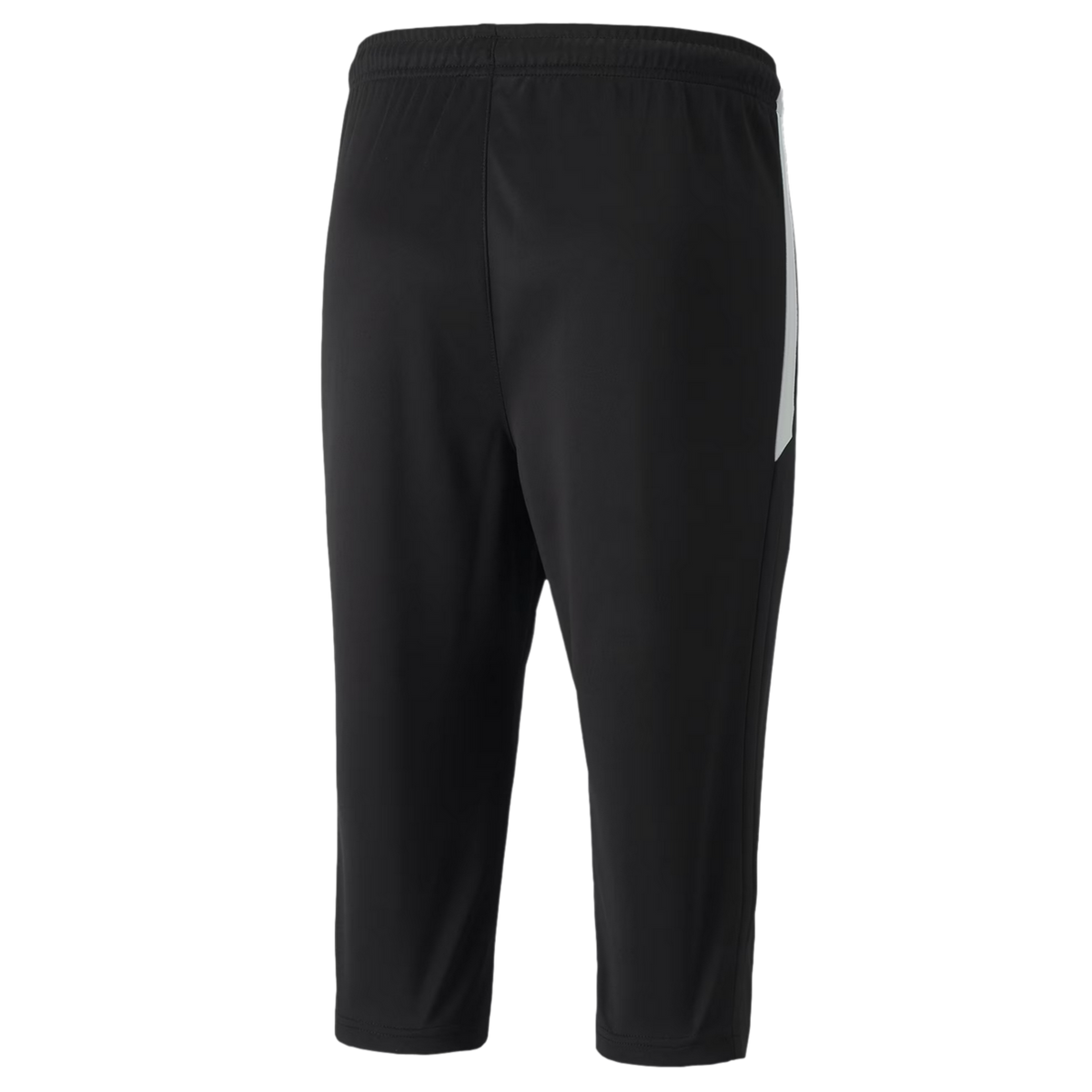 A rear view of three-quarter length black athletic training pants featuring an elastic waistband and a white panel on the right side.
