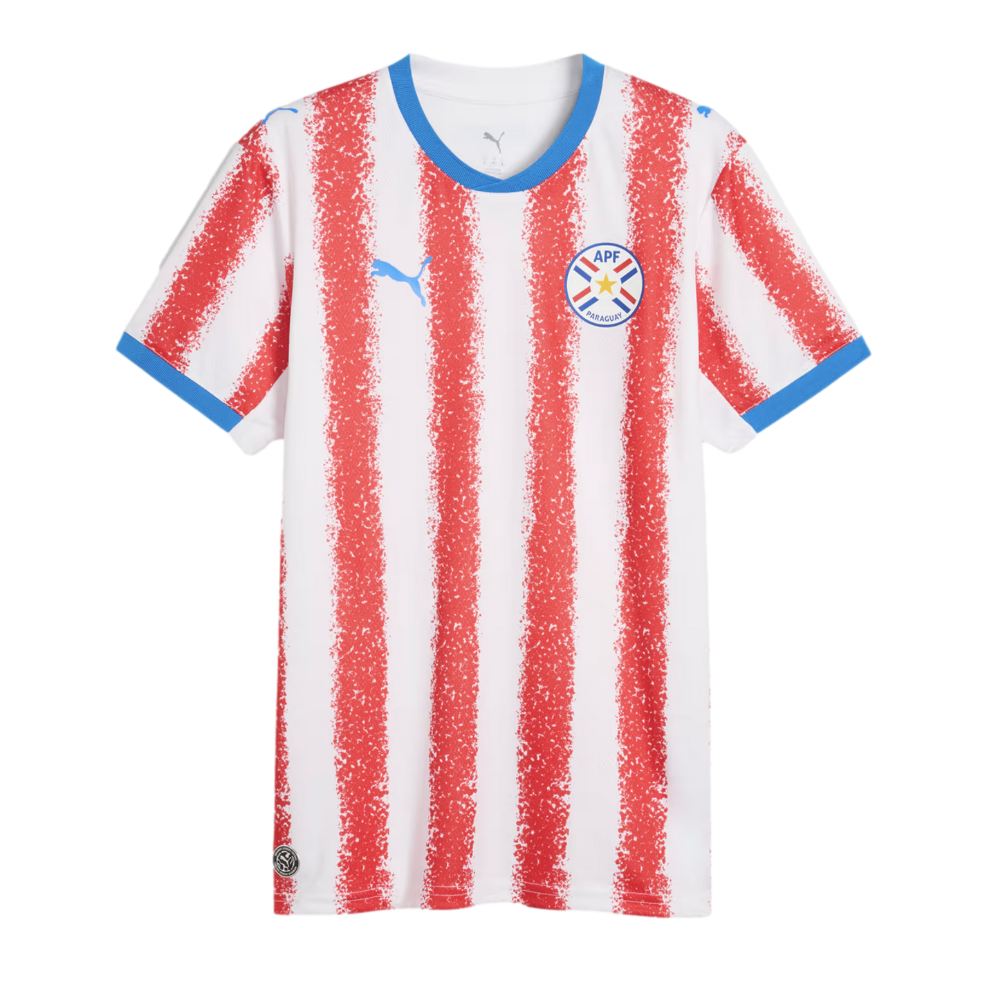 White football jersey with red spray-painted vertical stripes, blue collar and sleeve cuffs, blue Puma logo, and the APF Paraguay national team crest.
