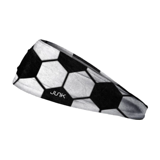 A tapered headband with a black and white soccer ball pattern and the JUNK brand logo, shown against a solid black background.