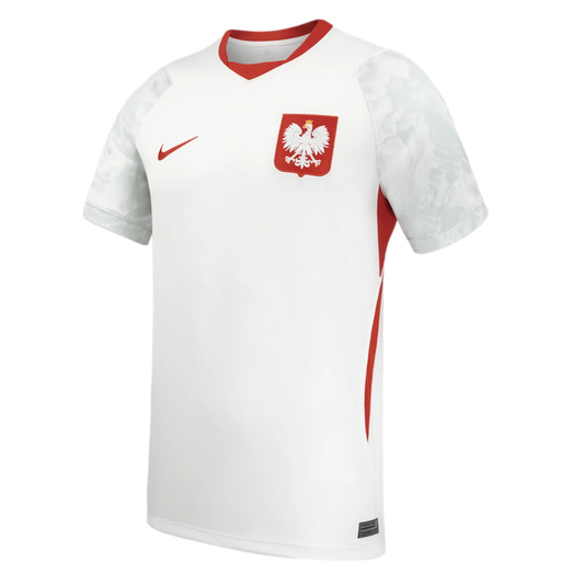 White Nike Poland national soccer jersey with red v-neck and side stripes. Features a red swoosh and centered eagle crest, with a subtle grey pattern on the sleeves.
