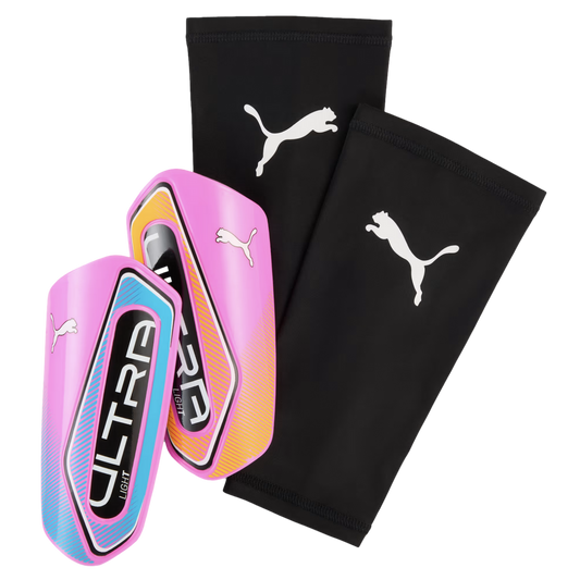 Pink Puma ULTRA Light shin guards with blue and orange accents and two black compression sleeves featuring white Puma logos.