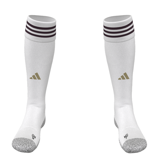 A pair of white Adidas knee-high soccer socks with three dark stripes on the cuff, a gold logo on the shin, and grey reinforced toes.